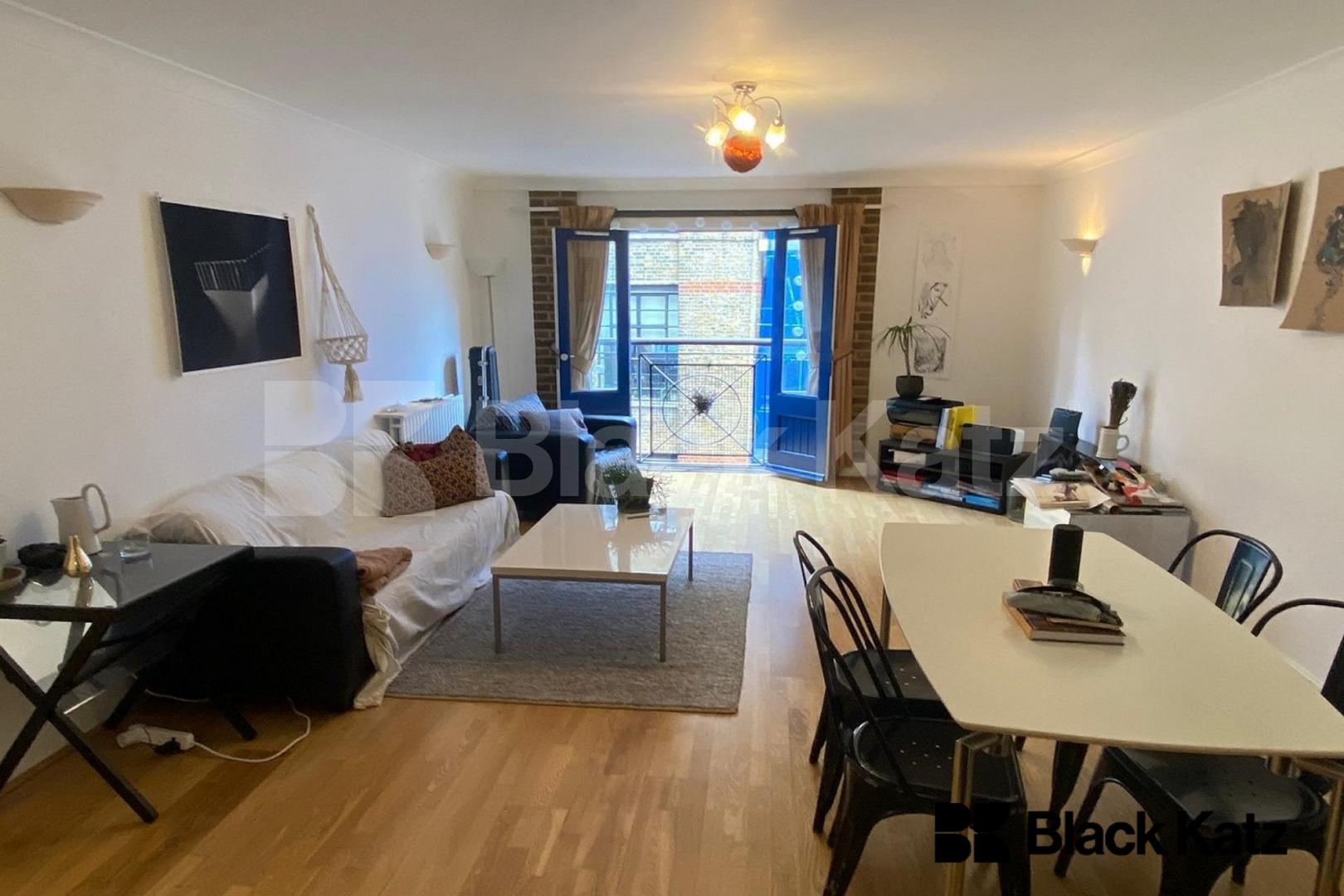 Warehouse style apartment with 900 sq. ft. of living and entertaining space Lion Court.  Shand Street, London Bridge